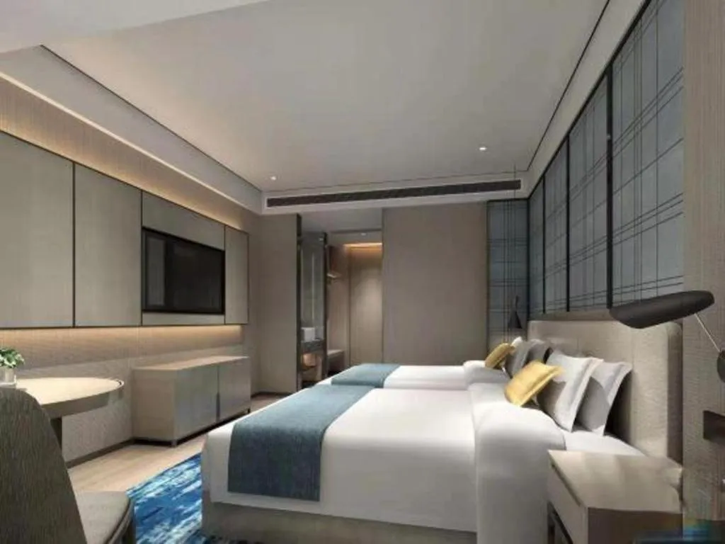 Bed in Echarm Hotel Shenzhen International Exhibition Center Fuyong