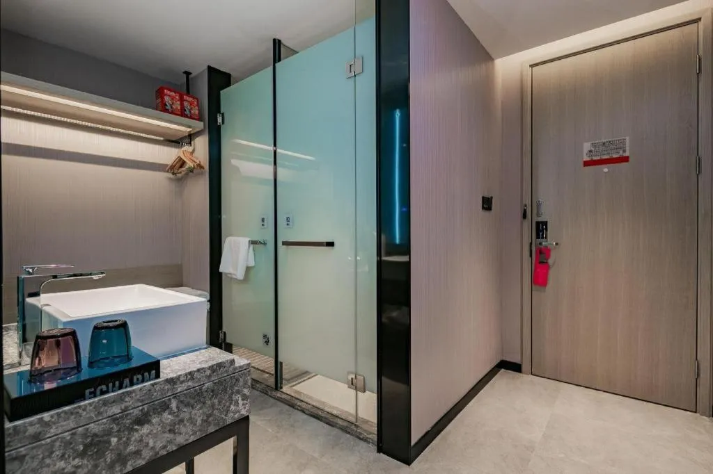 Bed in Echarm Hotel Shenzhen International Exhibition Center Fuyong