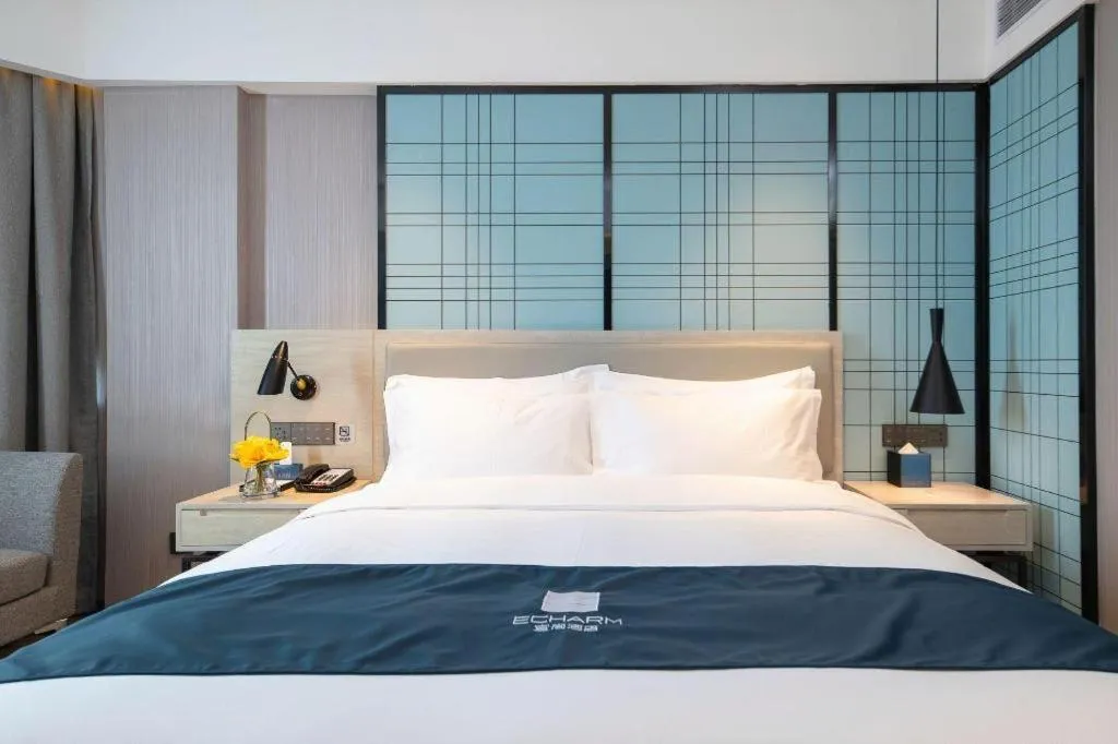 Bed in Echarm Hotel Shenzhen International Exhibition Center Fuyong