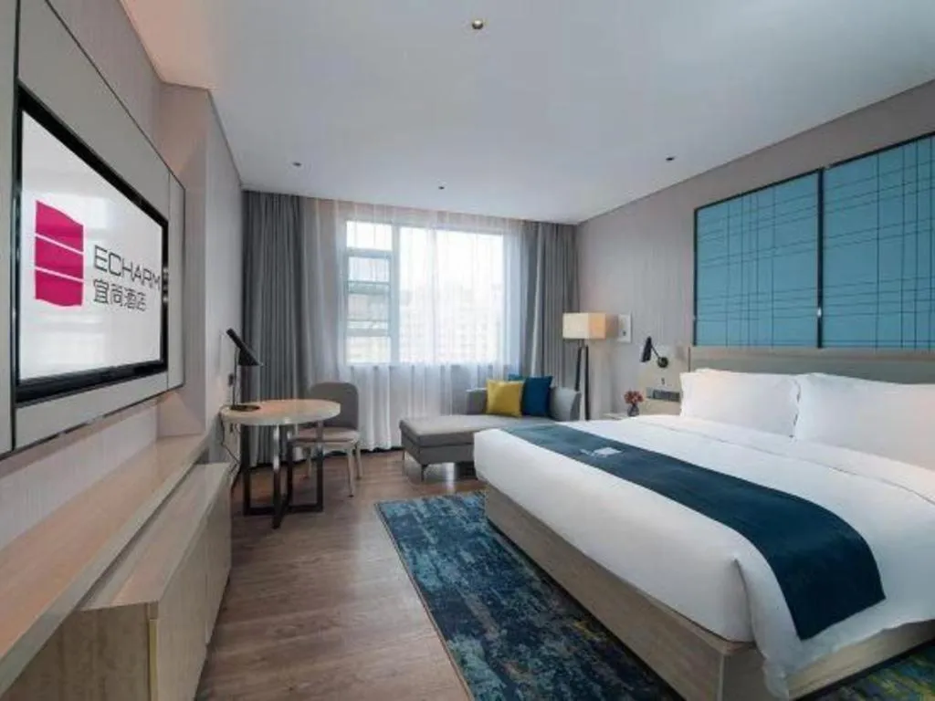 Bed in Echarm Hotel Shenzhen International Exhibition Center Fuyong