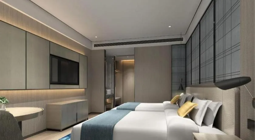 Bed in Echarm Hotel Shenzhen International Exhibition Center Fuyong