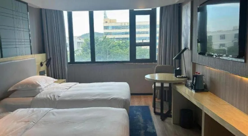 Bed in Echarm Hotel Shenzhen International Exhibition Center Fuyong