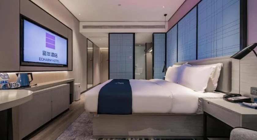 Bed in Echarm Hotel Shenzhen International Exhibition Center Fuyong