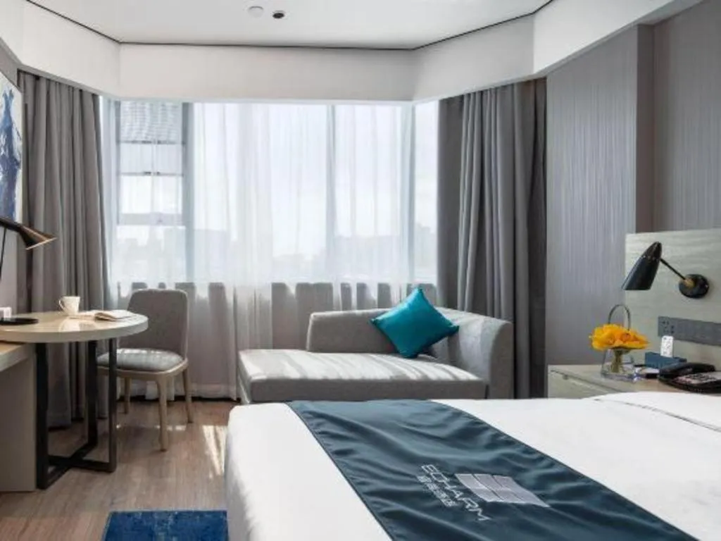 Bed in Echarm Hotel Shenzhen International Exhibition Center Fuyong