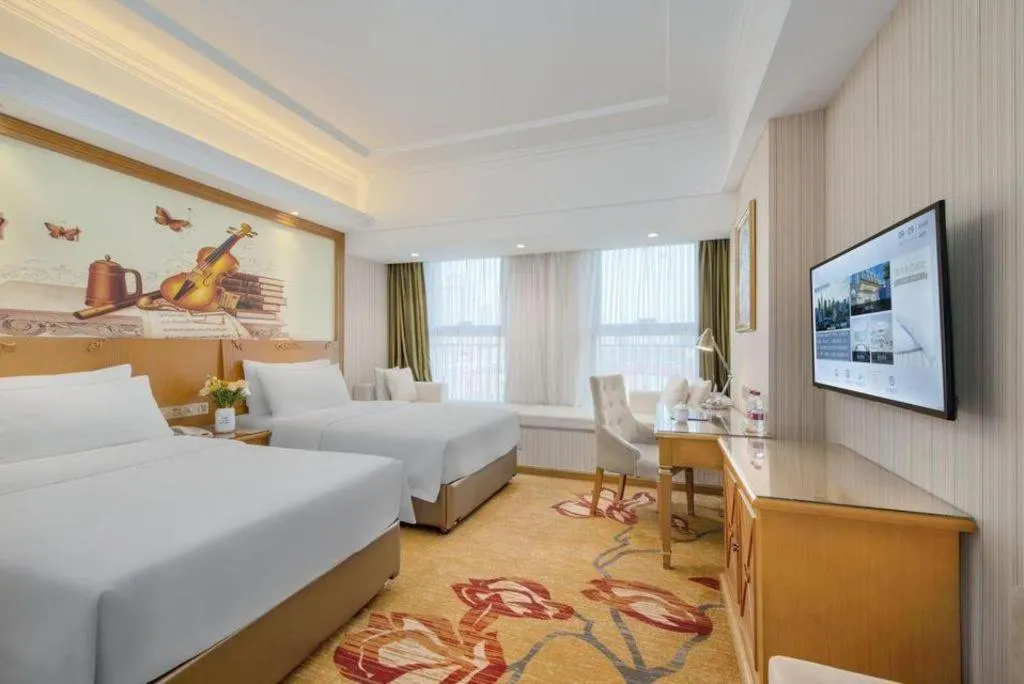 Bed in Vienna Hotel Zhengzhou Only Henan Movie Town