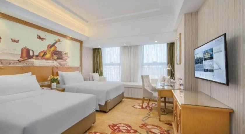 Bed in Vienna Hotel Zhengzhou Only Henan Movie Town