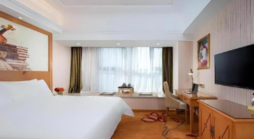 Bed in Vienna Hotel Zhengzhou Only Henan Movie Town
