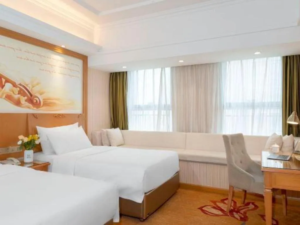 Bed in Vienna Hotel Zhengzhou Only Henan Movie Town