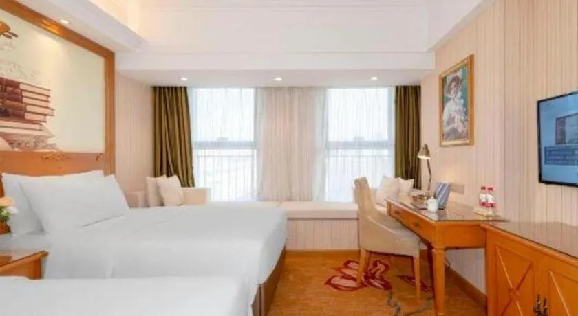 Bed in Vienna Hotel Zhengzhou Only Henan Movie Town