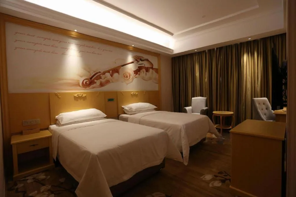 Bed in Vienna Hotel Hangzhou Jiubao Sijiqing Suanli Town