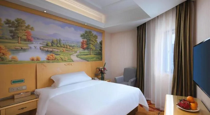 Bed in Vienna Hotel Hangzhou Jiubao Sijiqing Suanli Town