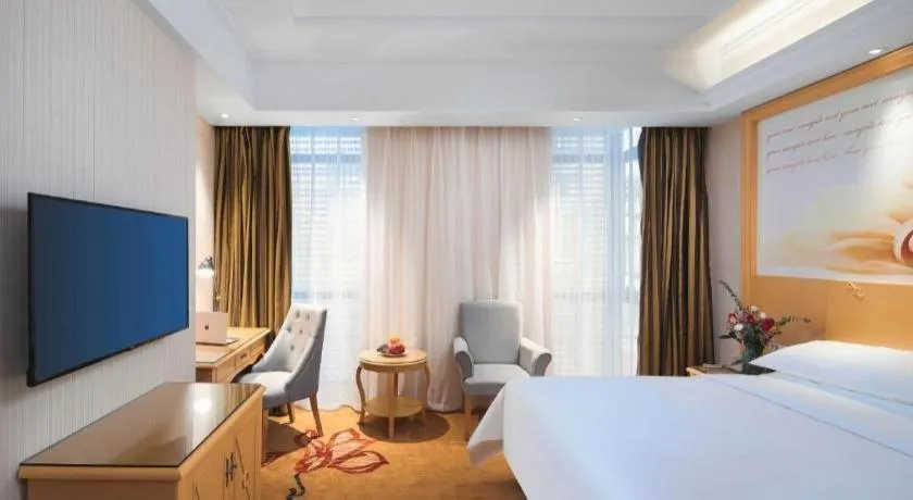 Bed in Vienna Hotel Hangzhou Jiubao Sijiqing Suanli Town