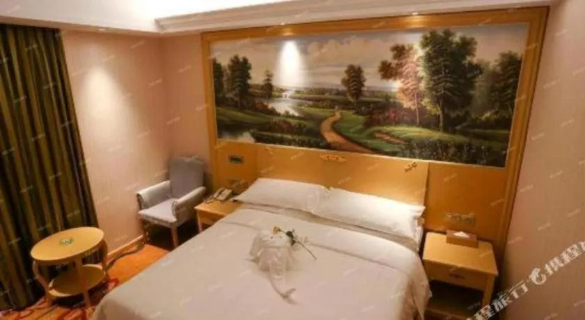 Bed in Vienna Hotel Hangzhou Jiubao Sijiqing Suanli Town