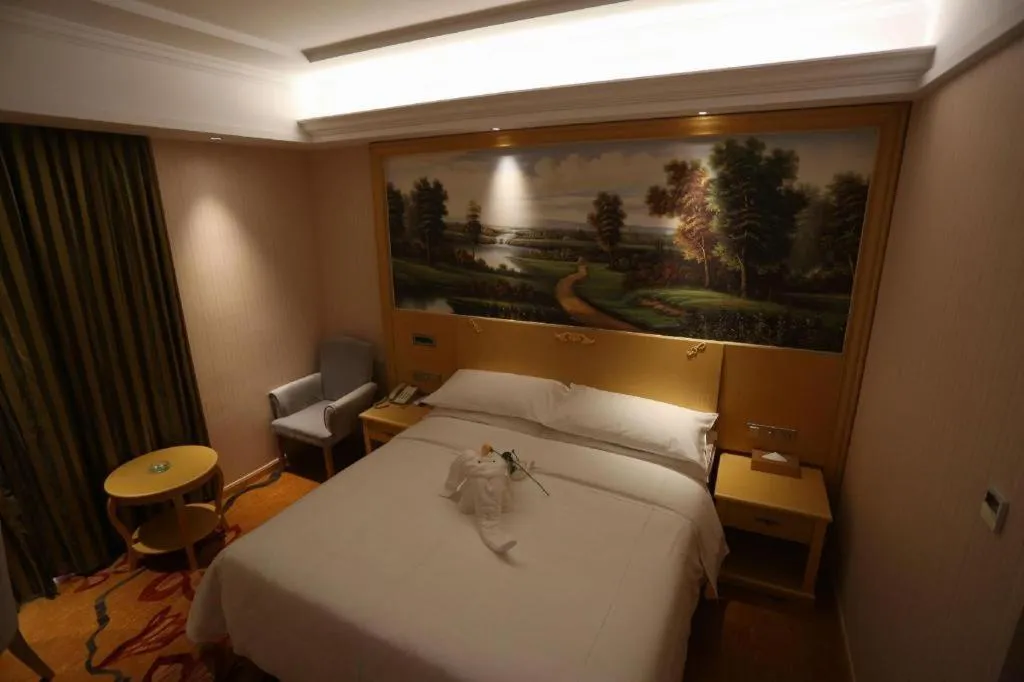 Bed in Vienna Hotel Hangzhou Jiubao Sijiqing Suanli Town