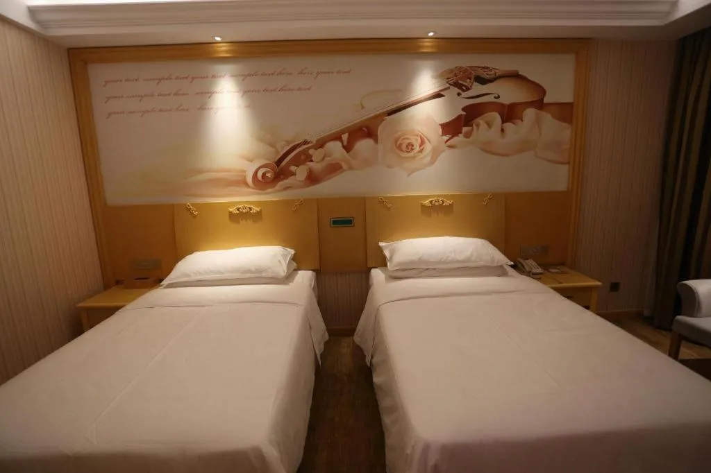 Bed in Vienna Hotel Hangzhou Jiubao Sijiqing Suanli Town