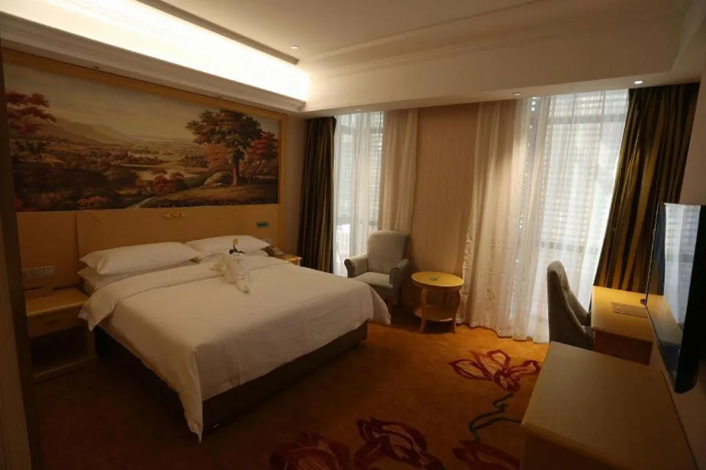 Bed in Vienna Hotel Hangzhou Jiubao Sijiqing Suanli Town