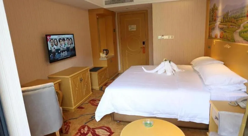 Bed in Vienna Hotel Hangzhou Jiubao Sijiqing Suanli Town