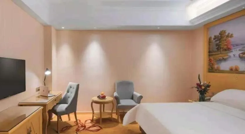 Bed in Vienna Hotel Hangzhou Jiubao Sijiqing Suanli Town
