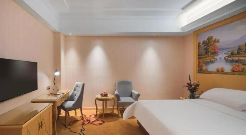 Bed in Vienna Hotel Hangzhou Jiubao Sijiqing Suanli Town