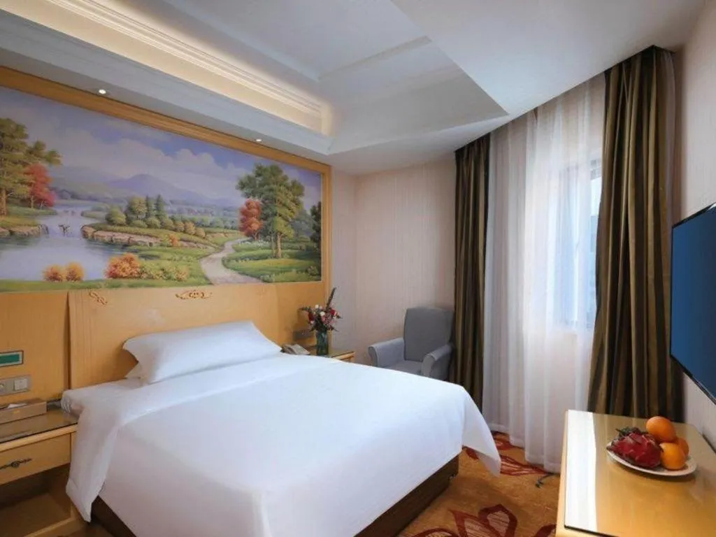 Bed in Vienna Hotel Hangzhou Jiubao Sijiqing Suanli Town