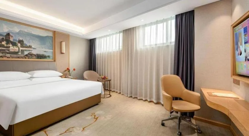 Bed in Vienna Hotel Guangzhou Yonghe Development Zone