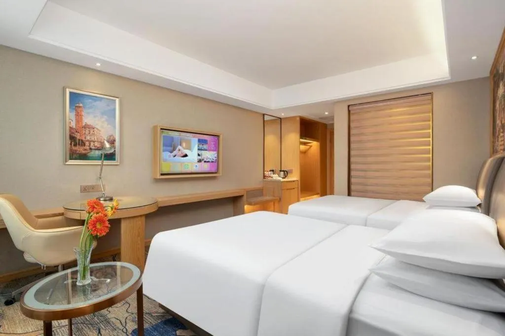 Bed in Vienna Hotel Guangzhou Yonghe Development Zone