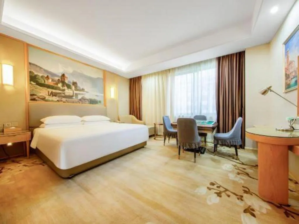 Bed in Vienna Hotel Guangzhou Yonghe Development Zone
