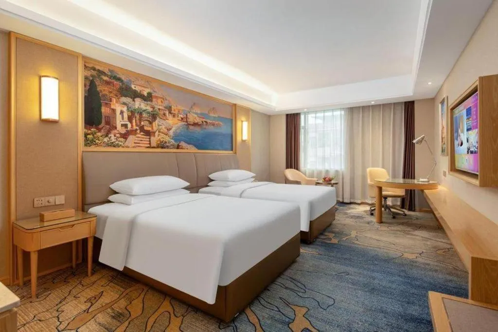 Bed in Vienna Hotel Guangzhou Yonghe Development Zone