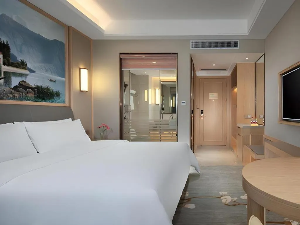 Bed in Vienna Hotel Guangzhou Yonghe Development Zone