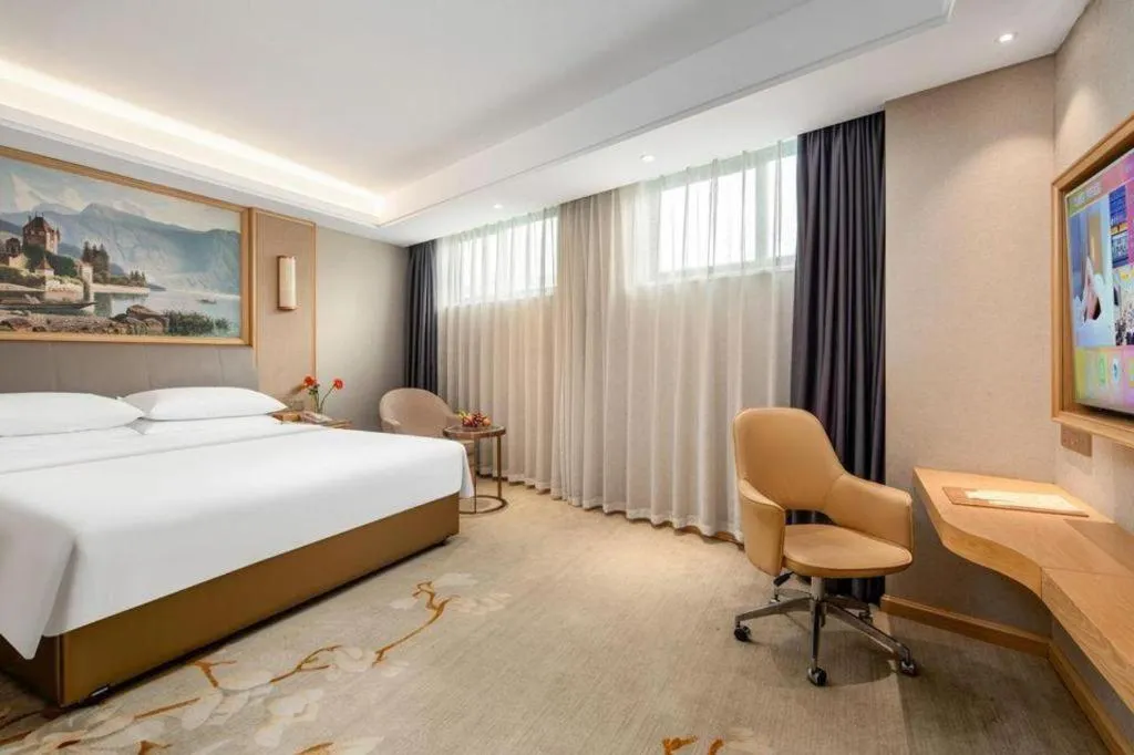 Bed in Vienna Hotel Guangzhou Yonghe Development Zone