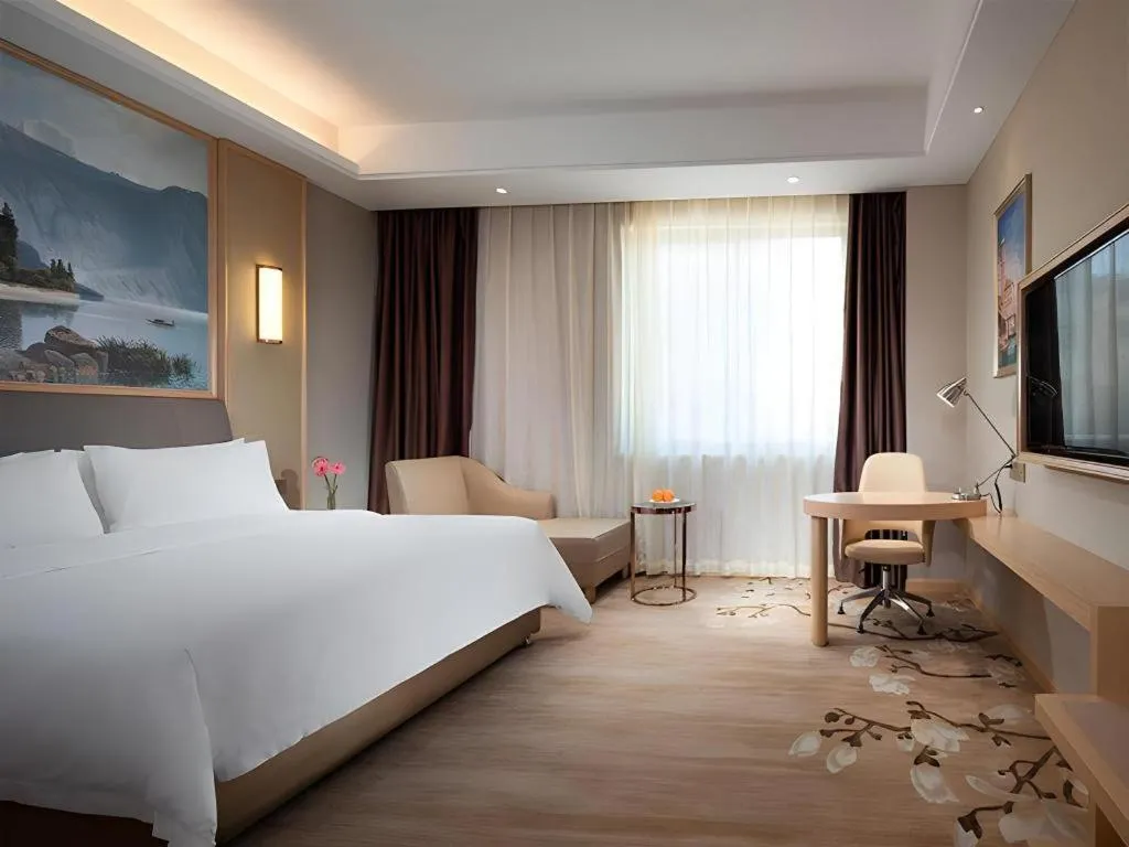 Bed in Vienna Hotel Guangzhou Yonghe Development Zone