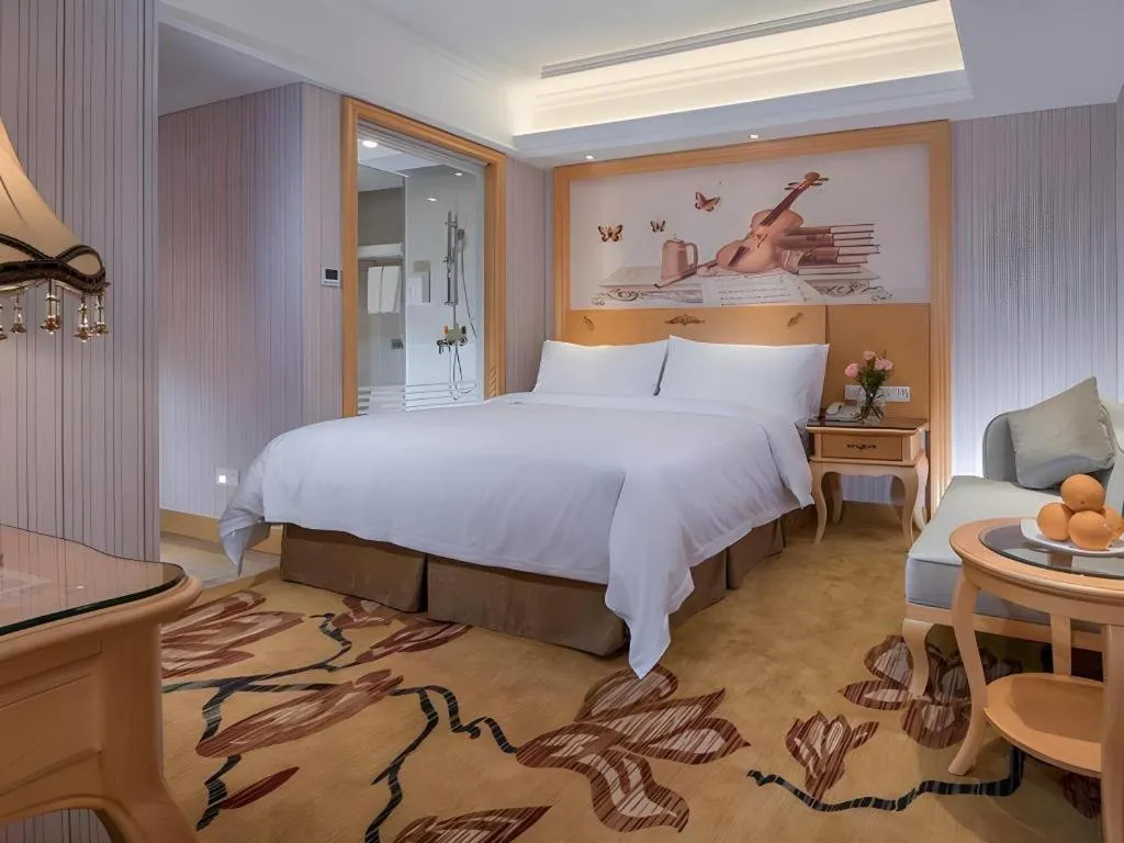 Bed in Vienna Hotel Shenzhen Qinghu Metro Station