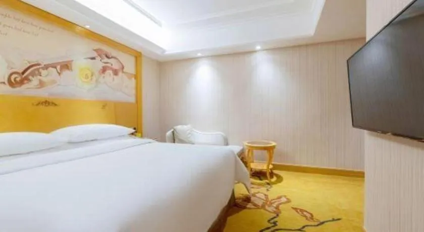 Bed in Vienna Hotel Shenzhen Qinghu Metro Station