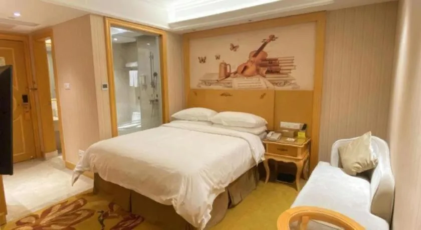 Bed in Vienna Hotel Shenzhen Qinghu Metro Station