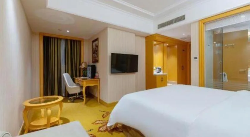 Bed in Vienna Hotel Shenzhen Qinghu Metro Station