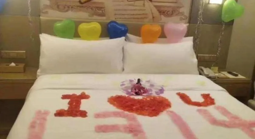 Bed in Vienna Hotel Shenzhen Guanlan Shanshuitianyuan Xintian