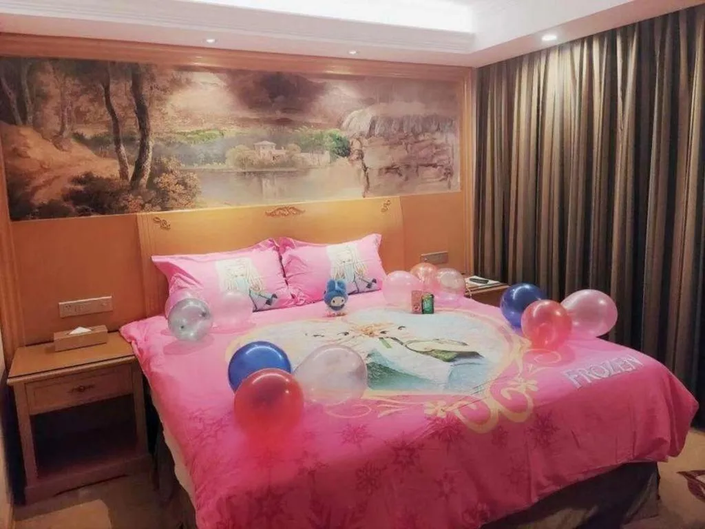 Bed in Vienna Hotel Shenzhen Guanlan Shanshuitianyuan Xintian