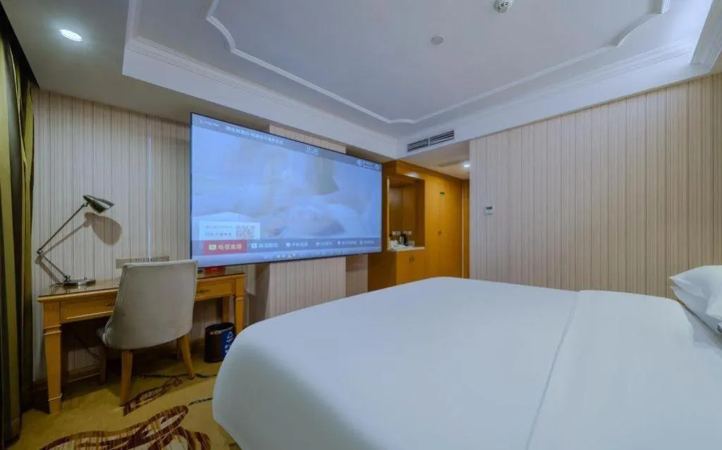 Bed in Vienna Hotel Shenzhen Guanlan Shanshuitianyuan Xintian
