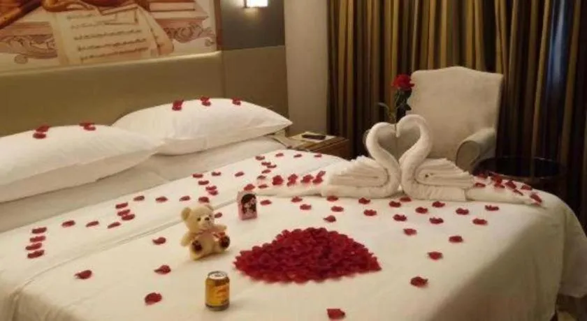 Bed in Vienna Hotel Shenzhen Guanlan Shanshuitianyuan Xintian