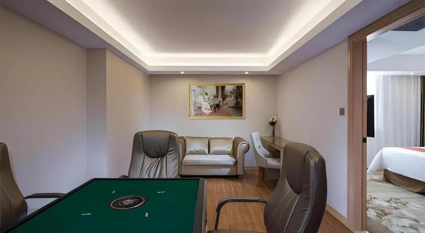 Bed in Vienna Hotel Shenzhen Guanlan Shanshuitianyuan Xintian