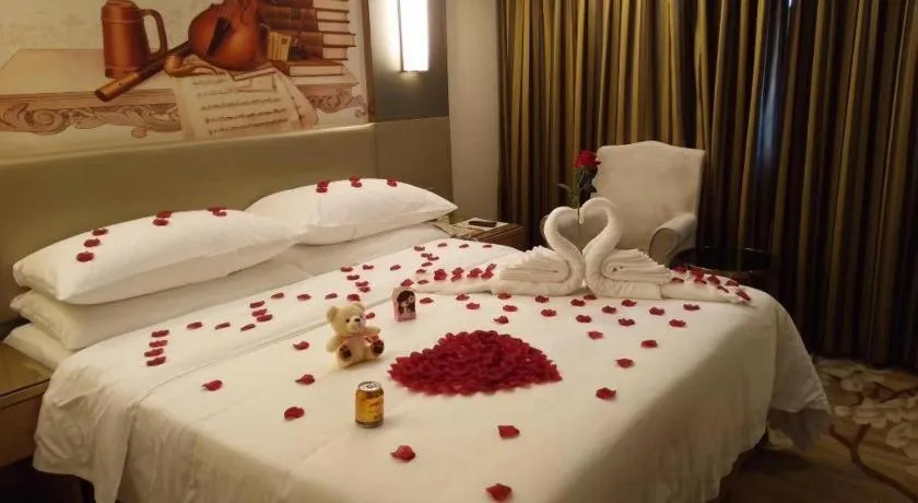 Bed in Vienna Hotel Shenzhen Guanlan Shanshuitianyuan Xintian