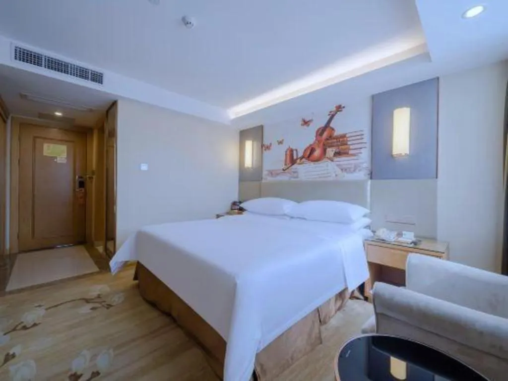 Bed in Vienna Hotel Shenzhen Guanlan Shanshuitianyuan Xintian