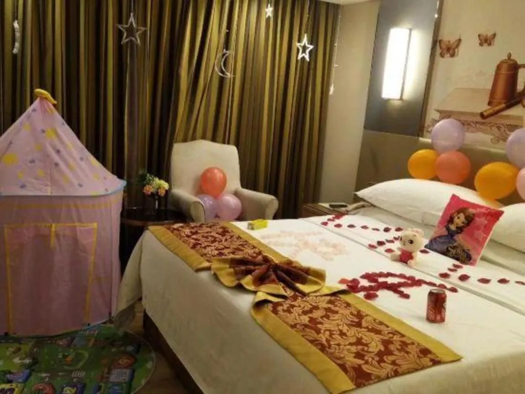 Bed in Vienna Hotel Shenzhen Guanlan Shanshuitianyuan Xintian