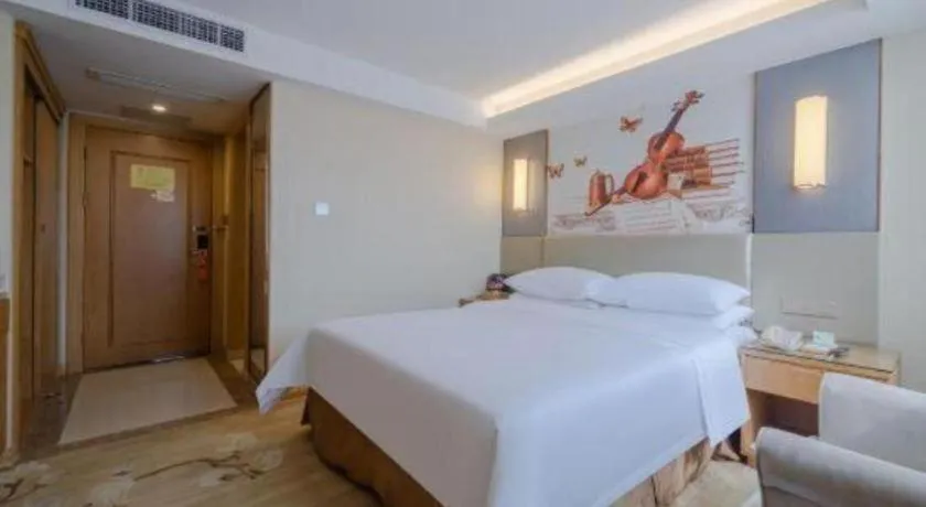 Bed in Vienna Hotel Shenzhen Guanlan Shanshuitianyuan Xintian
