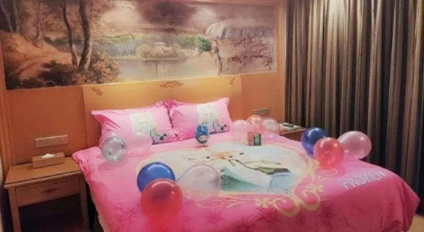 Bed in Vienna Hotel Shenzhen Guanlan Shanshuitianyuan Xintian