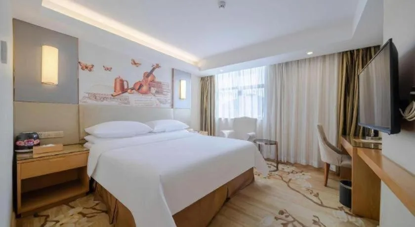 Bed in Vienna Hotel Shenzhen Guanlan Shanshuitianyuan Xintian