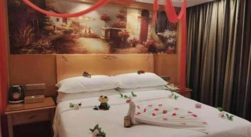 Bed in Vienna Hotel Shenzhen Guanlan Shanshuitianyuan Xintian