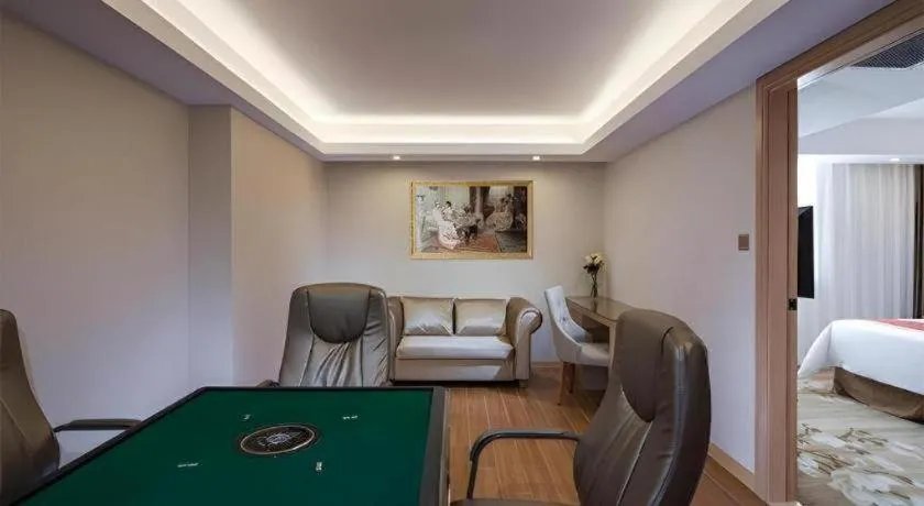 Bed in Vienna Hotel Shenzhen Guanlan Shanshuitianyuan Xintian