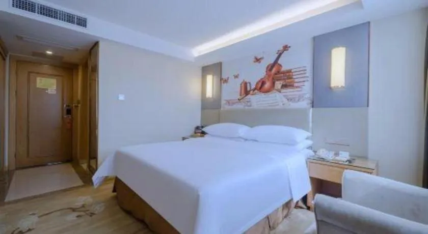 Bed in Vienna Hotel Shenzhen Guanlan Shanshuitianyuan Xintian