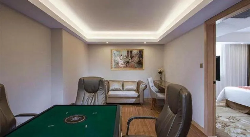 Bed in Vienna Hotel Shenzhen Guanlan Shanshuitianyuan Xintian